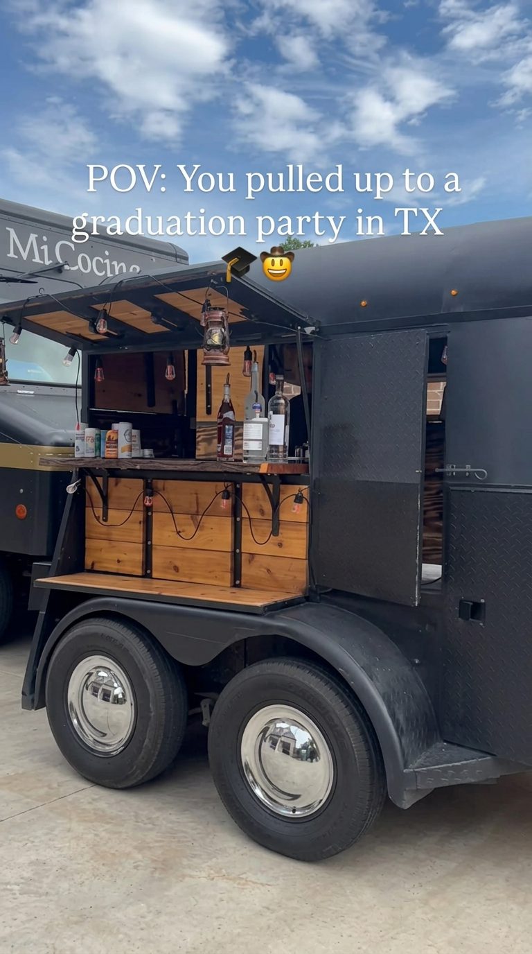 The black Double R trailer set up for a Texas graduation party