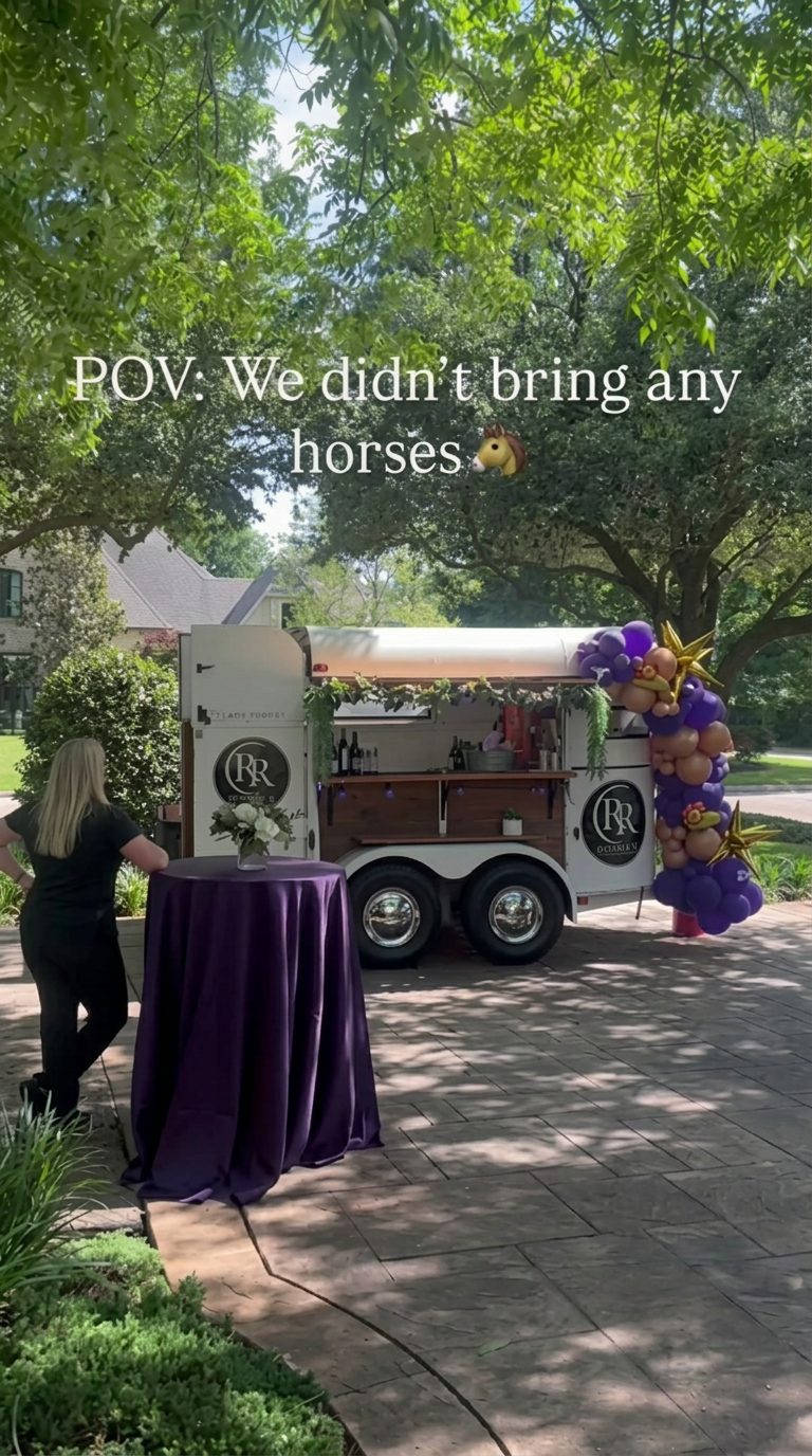 The Double R trailer with balloon decor at a backyard celebration